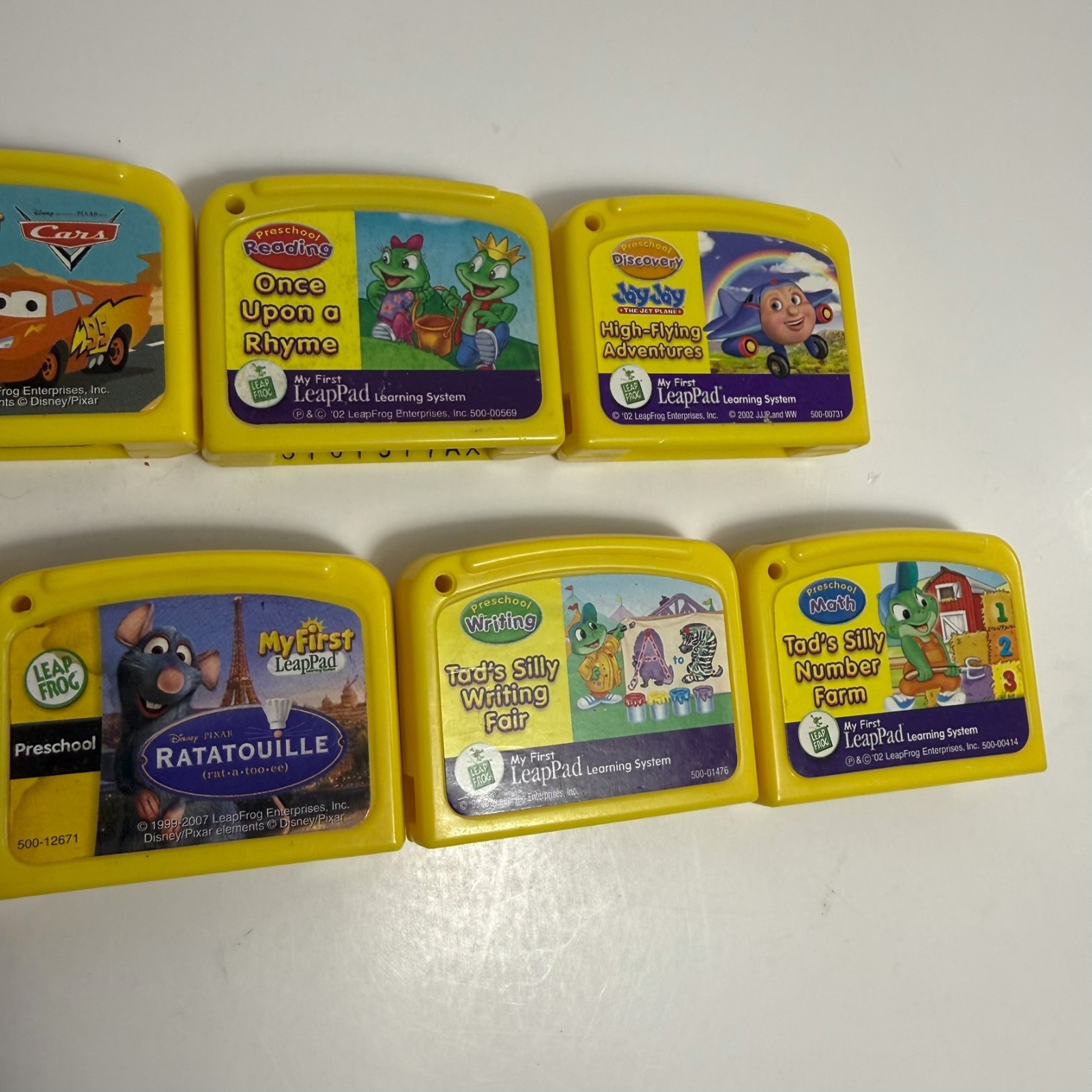 Lot of 7 Leap Frog Game Cartridges Pixar Cars Jay Jay Thomas Train etc My first