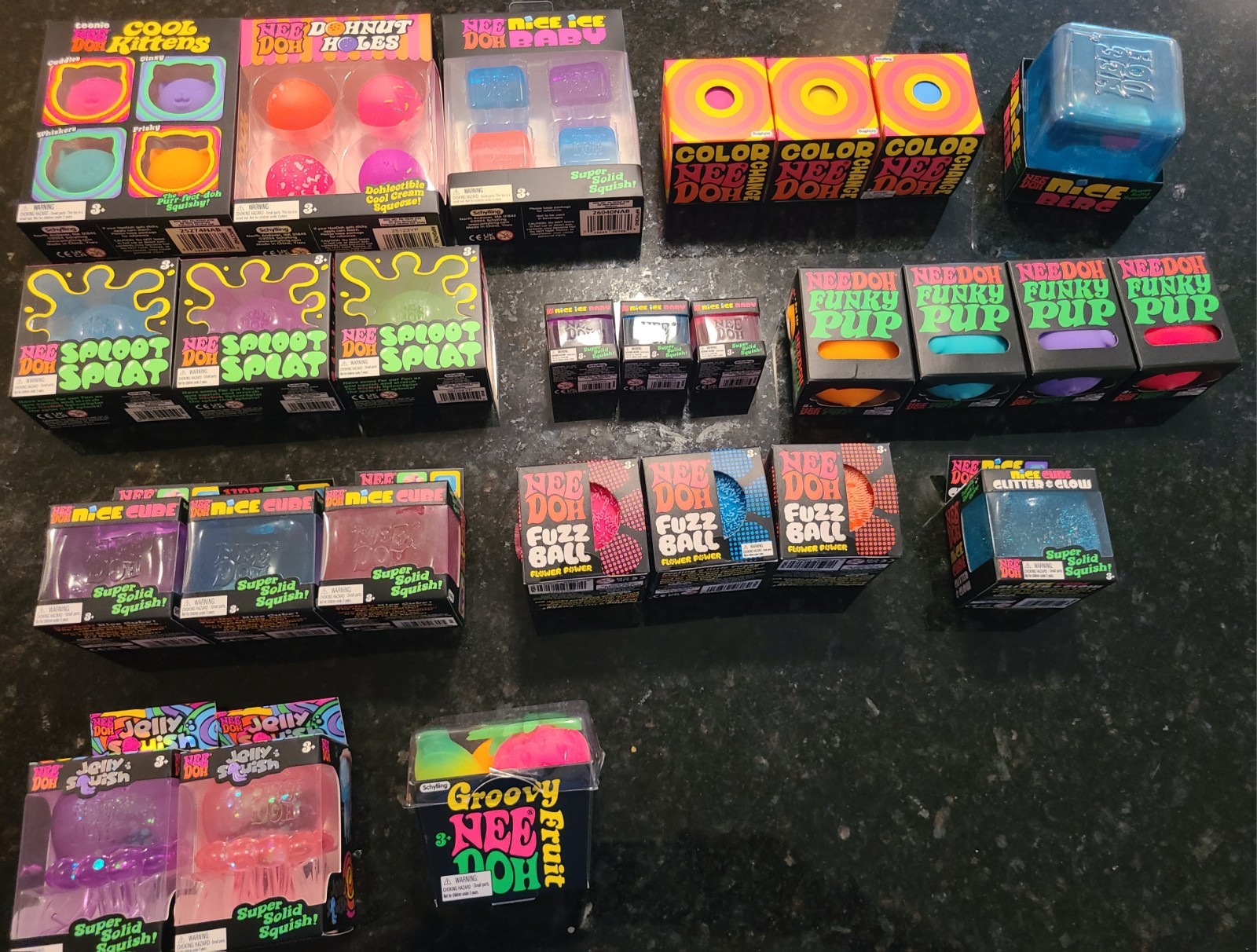 LOT — of 50 Schylling Needoh, Sunny Days Squeezy, RMS Mystery Dumpling, BUNDLE