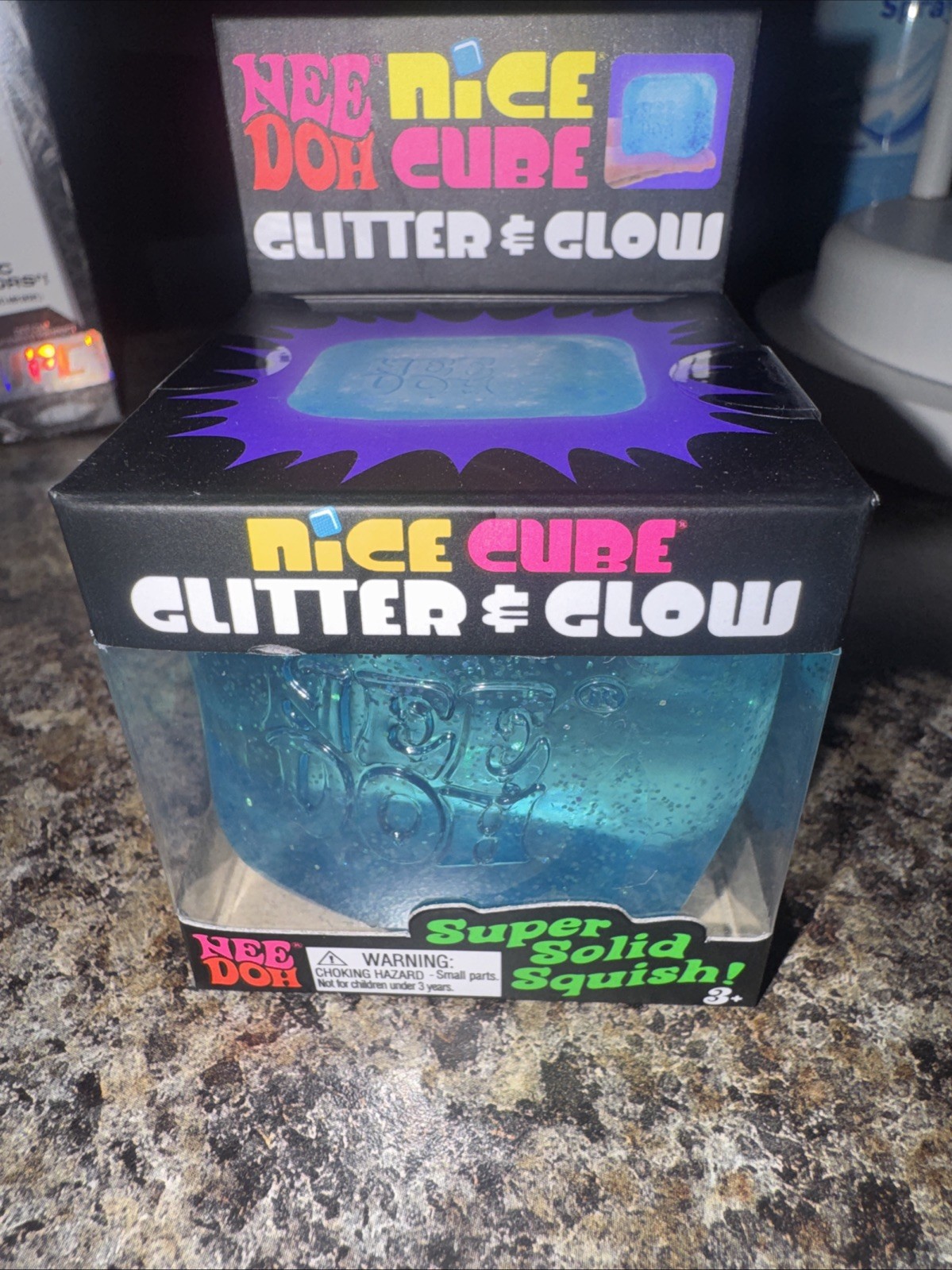 NeeDoh Nice Cube Glitter and Glow, Nee Doh Squishy, Glowing Ice Cube BLUE