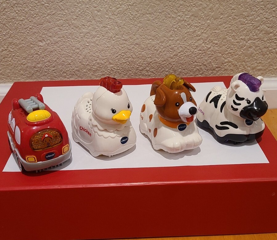 VTech Go Go Smart Wheels Fire Truck, Chicken, Dog and Zebra.
