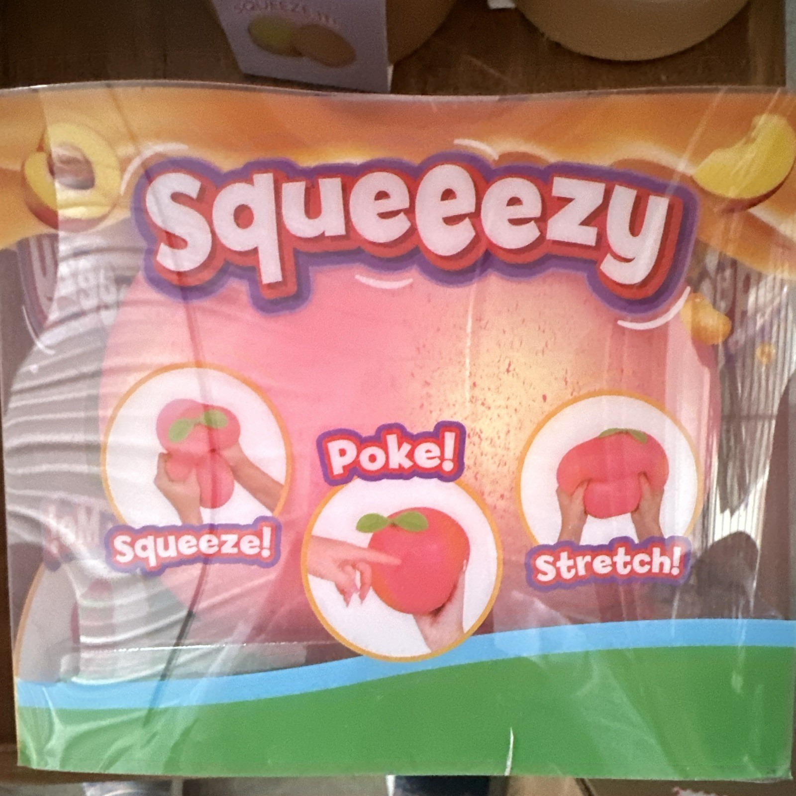 SqueeezyPeach Squeeze Poke Stretch Squeeze Toy, Pink/Green, Ages 3+, 571074
