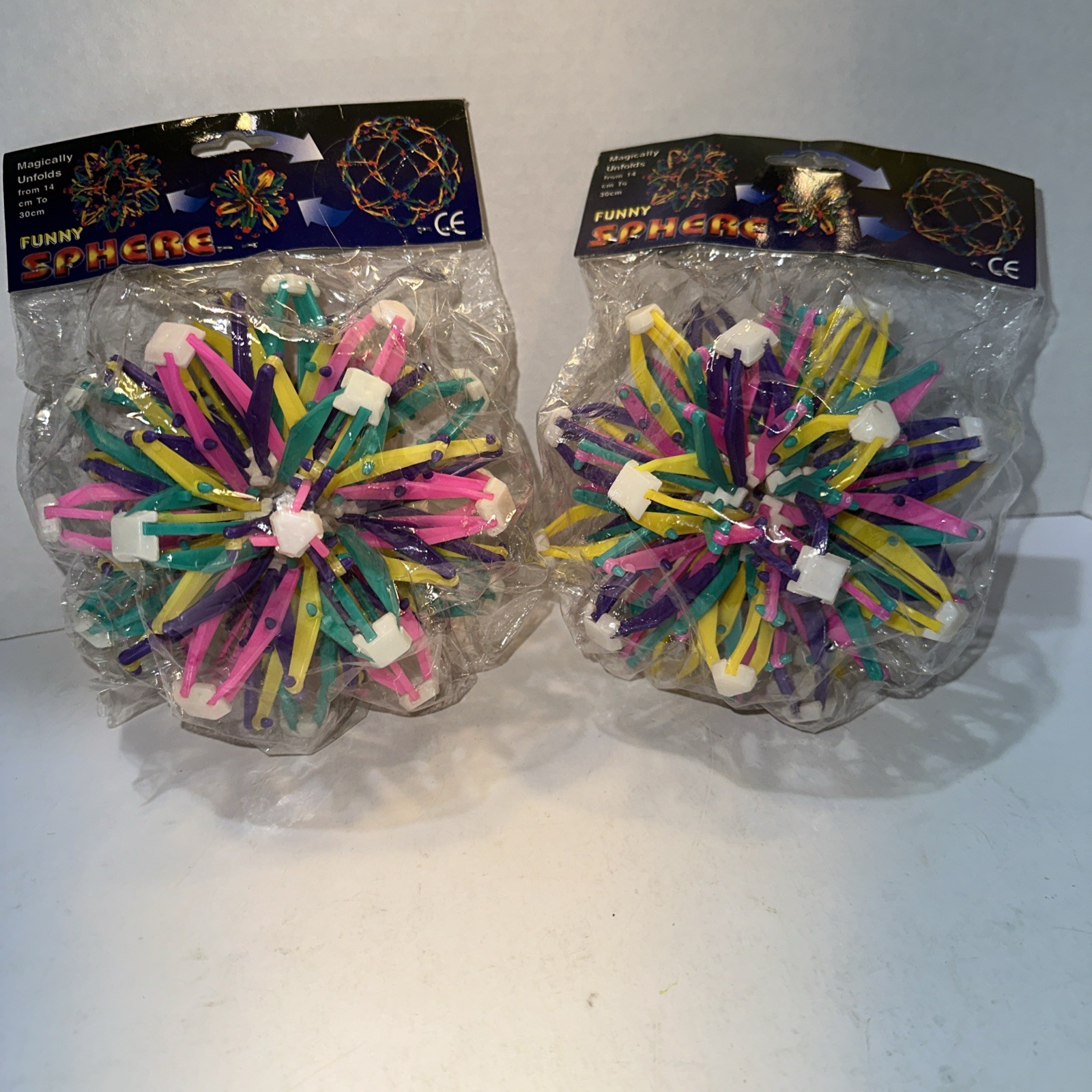 Funny Sphere Transforming Globe Toy NIP Magically Unfolds, Rainbow Colored Lot/2