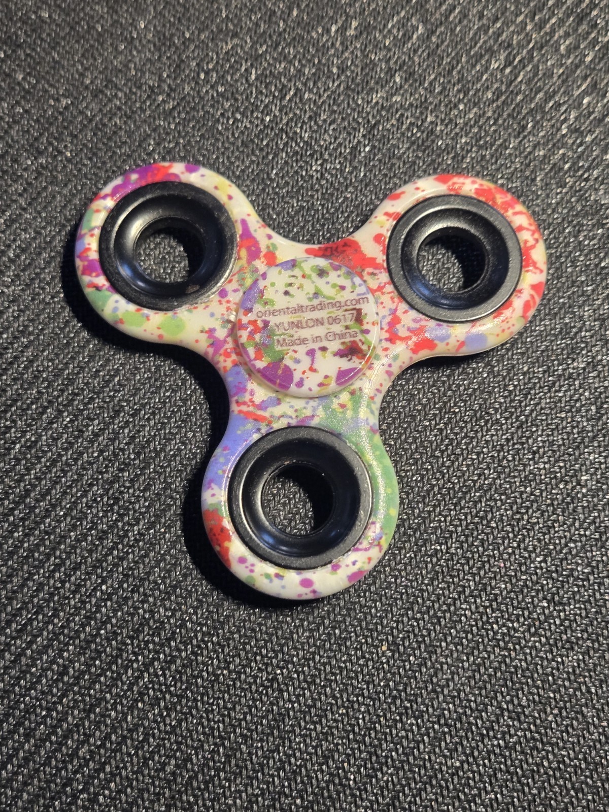 Multi color paint splatter 3 Way 3 inch Fidget Spinner Lightly Used Deal