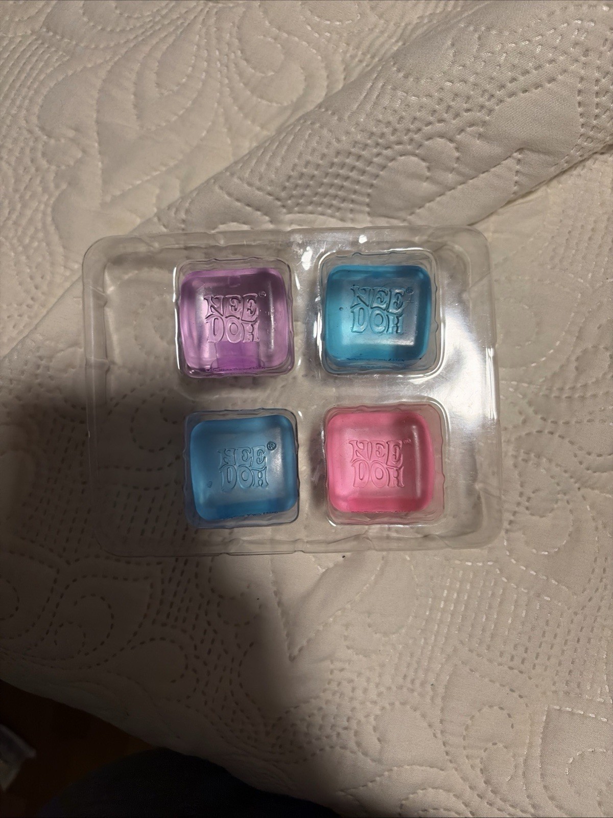 NeeDoh Nice Ice Baby 4 pack, Set of Four Nee Doh Mini Nice Cube Pink Blue Purple