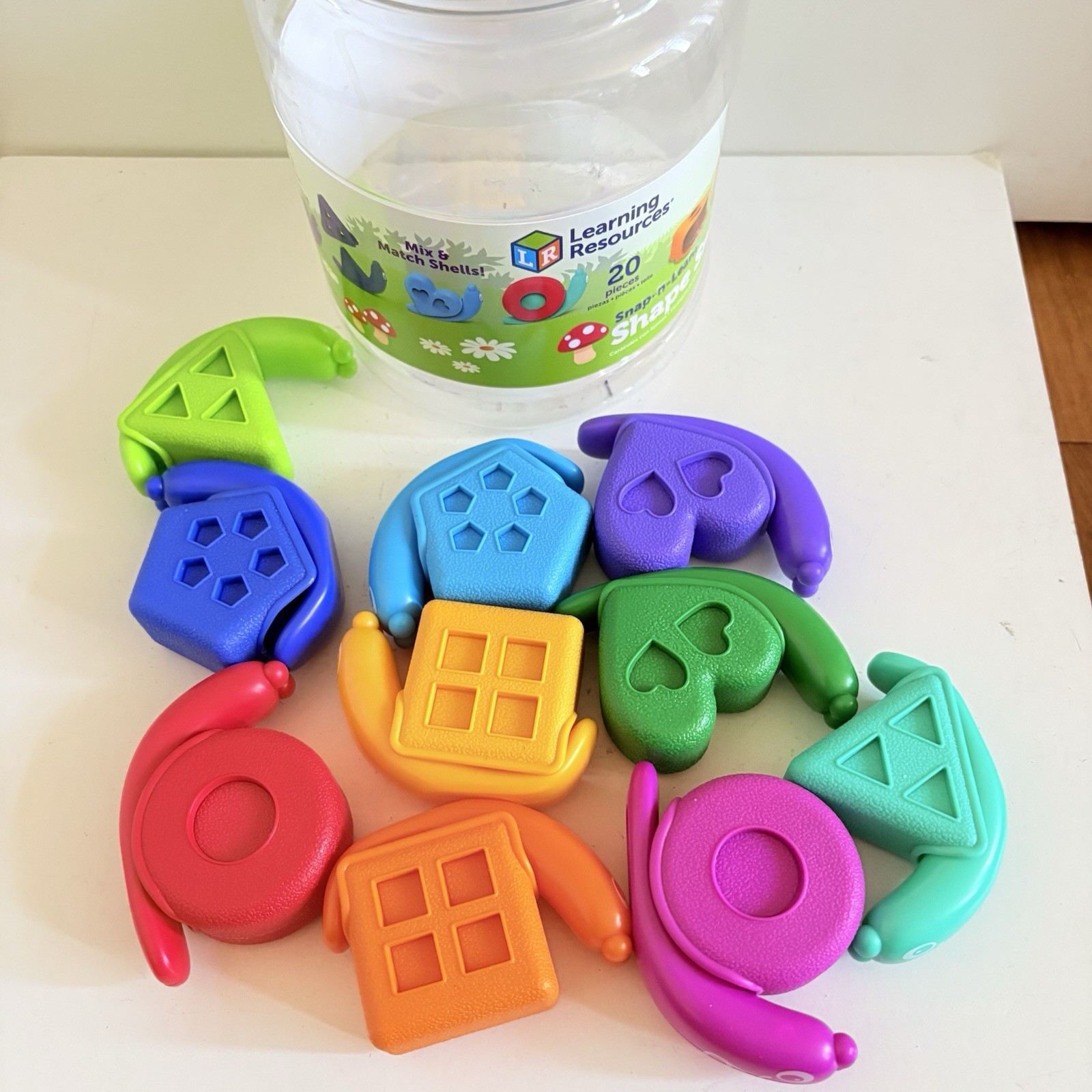 Learning Resources Snap n Learn Shape Snails 20 Piece Educational Toy Jar 18 mos