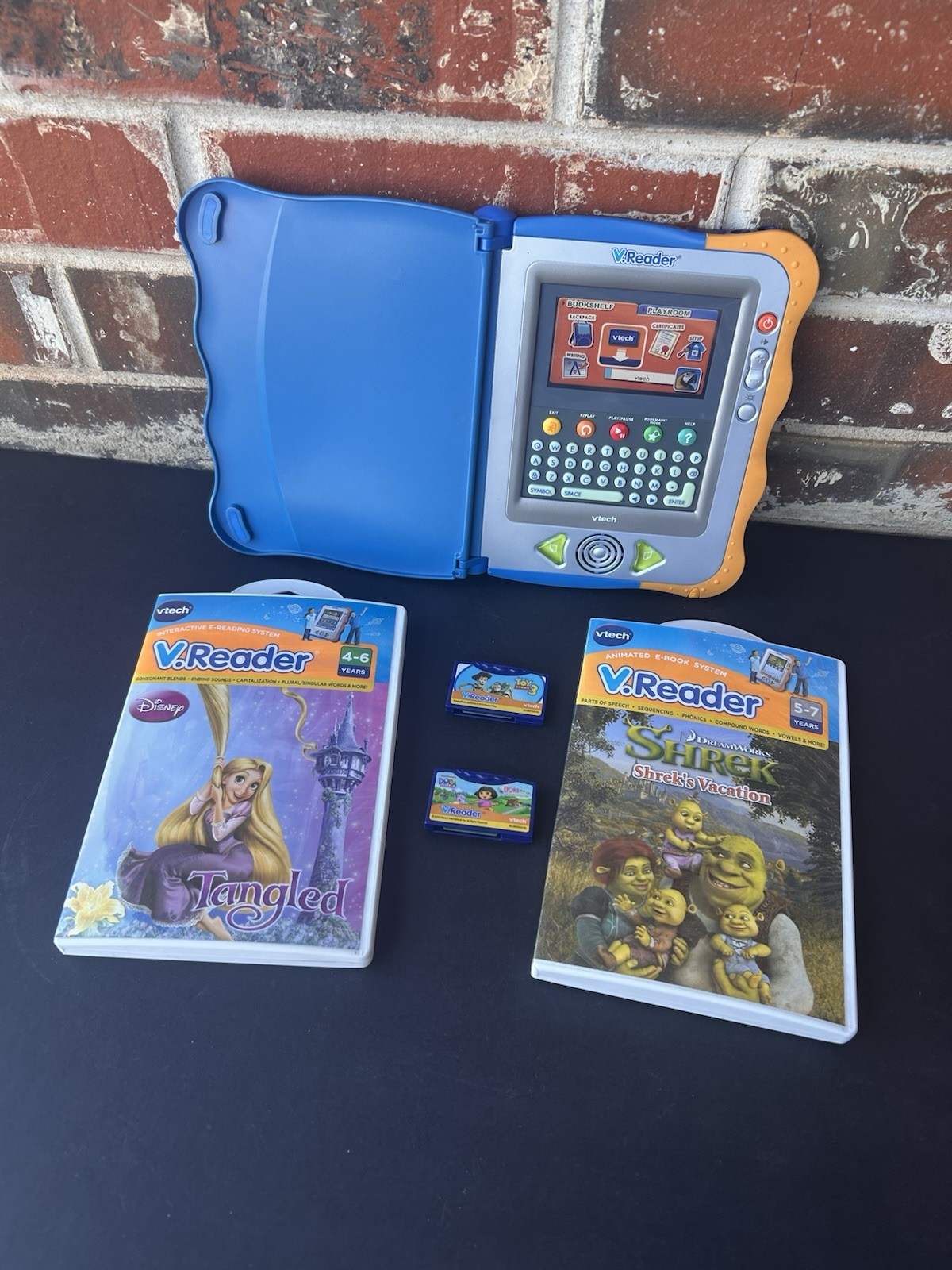 VTECH V. Reader With Four Games Tested Shrek Dora Tangled Toy Story