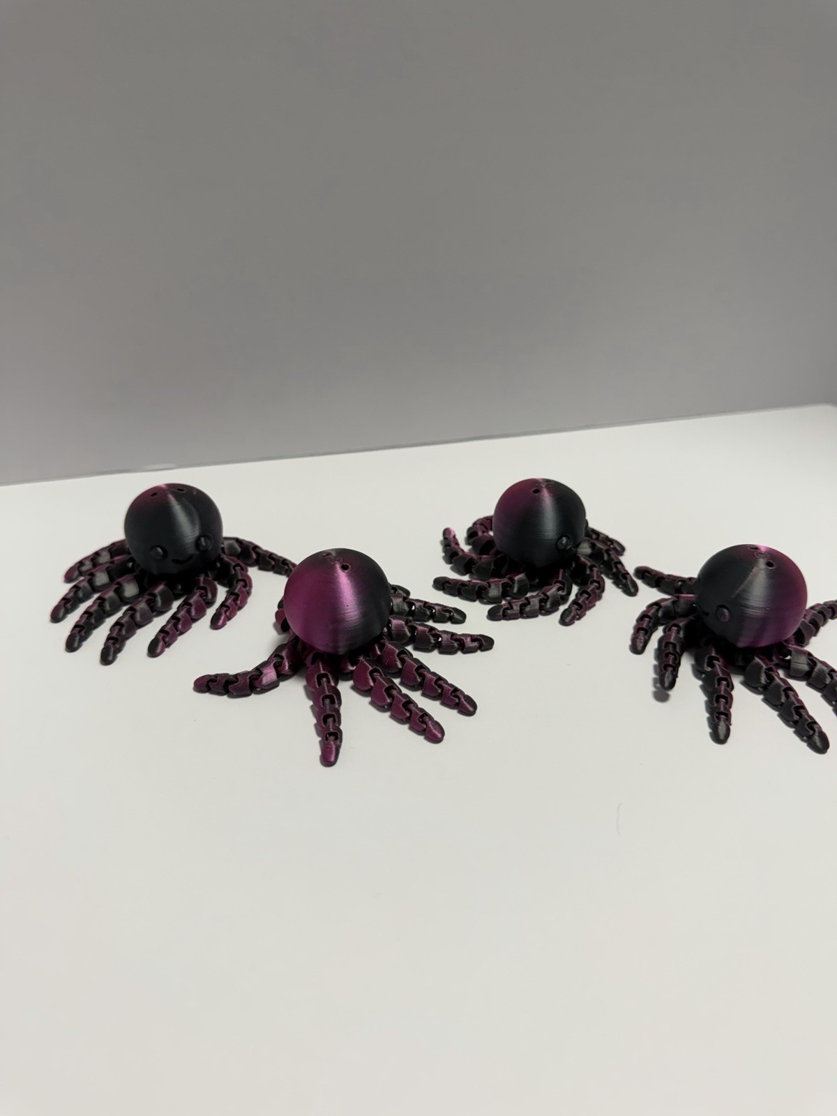 4 Black and Pink Articulated Octopus Fidget
