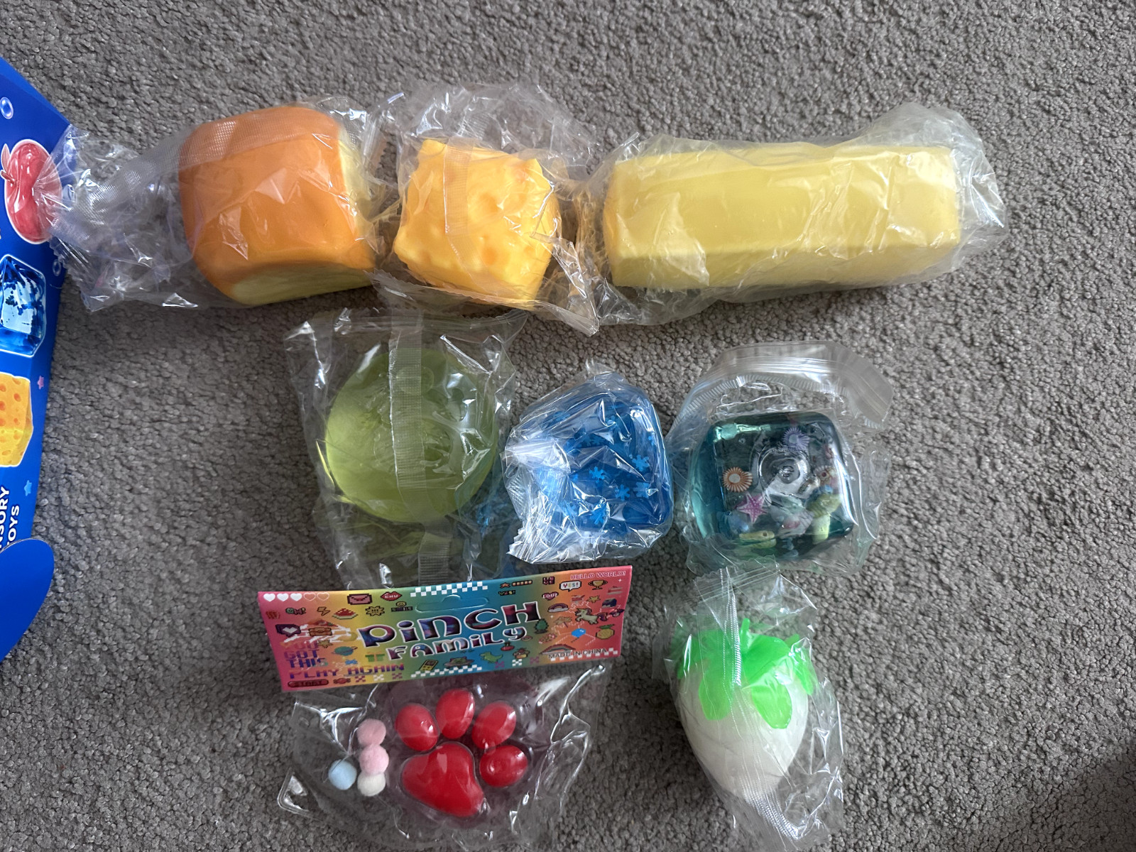 ONE (1) BOX OF SQUISHY FUN EIGHT SENSORY TOYS
