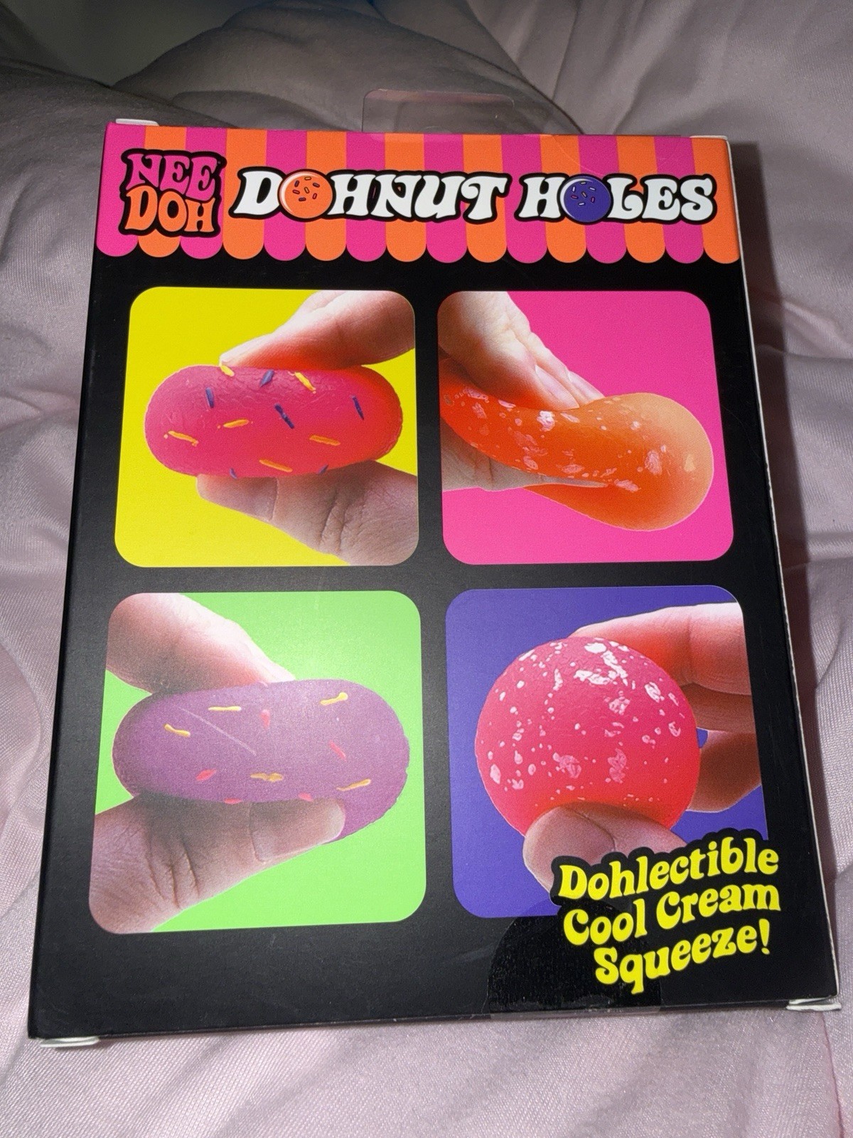 NeeDoh Dohnut Holes Dohlectible Squeeze Toy Set. Orange,Pink and Purple.