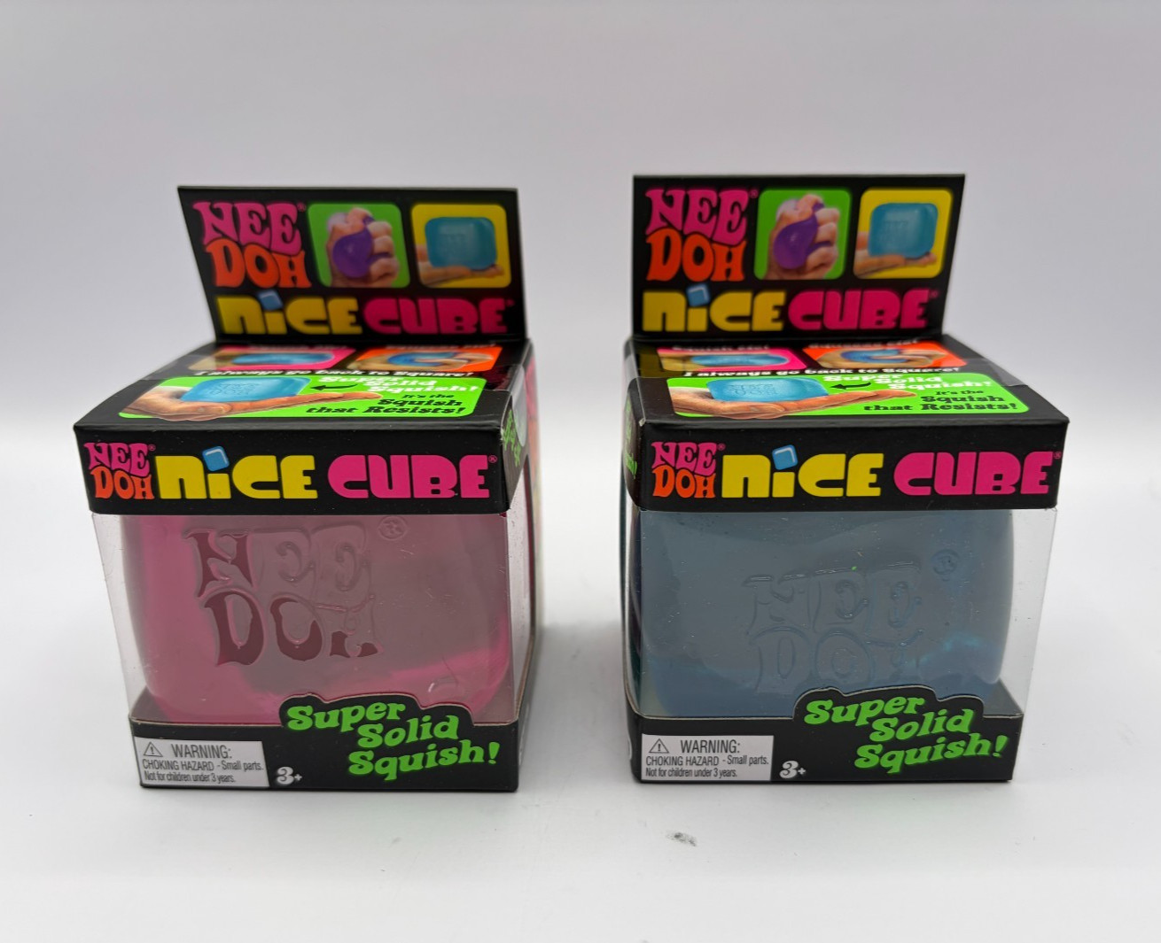 NeeDoh Nice Cube Solid Squish cube 1 Blue 1 Pink