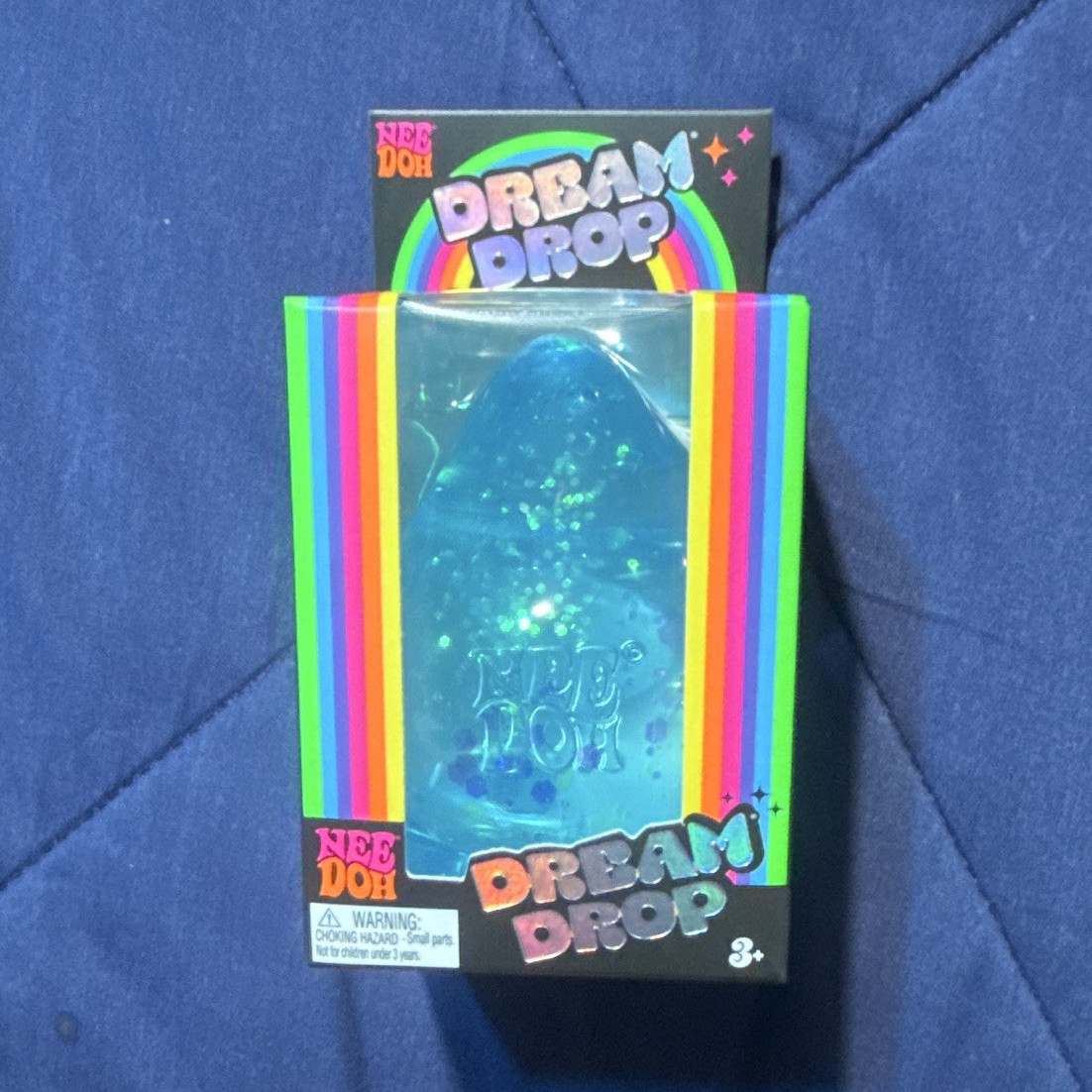 NeeDoh Dream Drop Squeeze Toy, Blue, Ages 3+l)