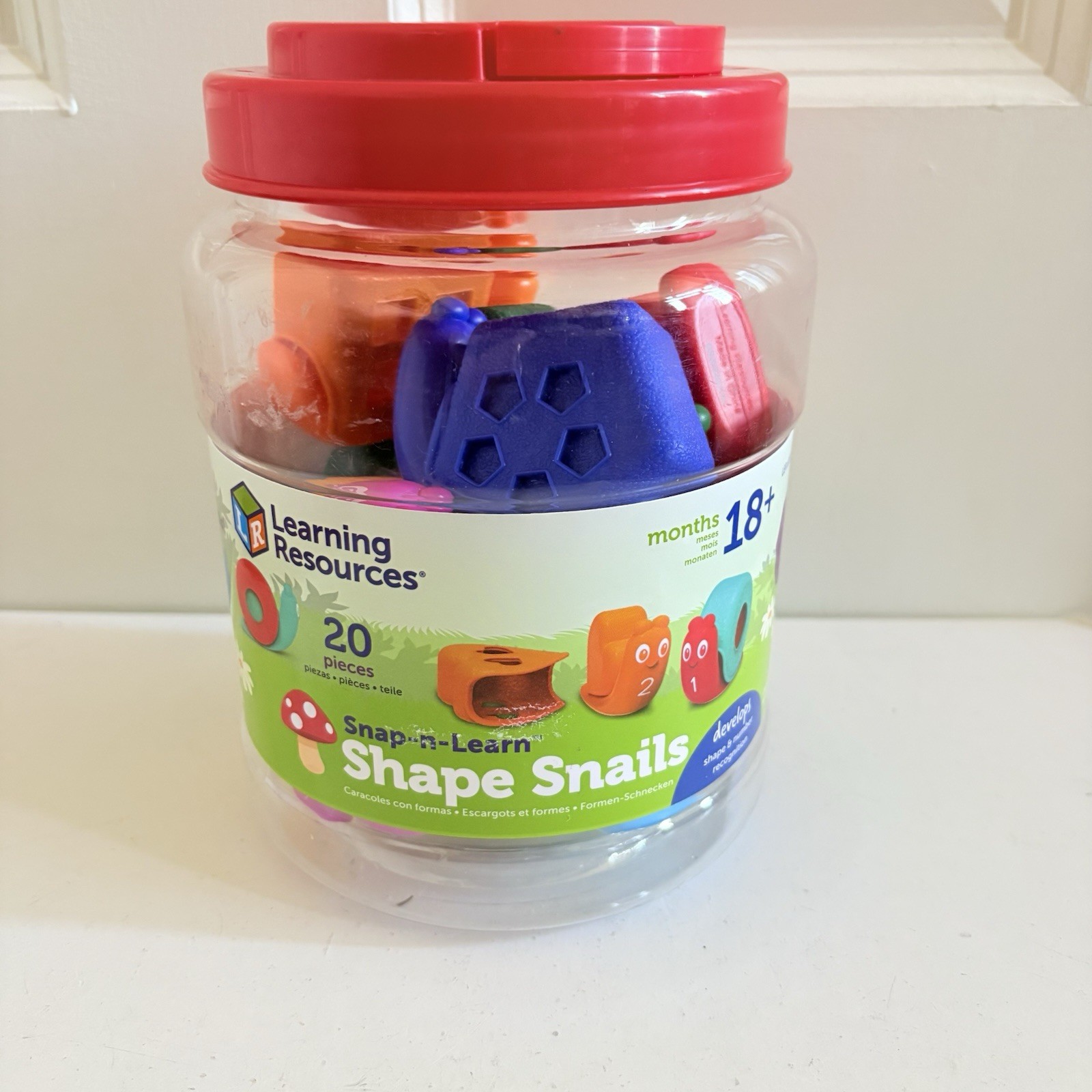 Learning Resources Snap n Learn Shape Snails 20 Piece Educational Toy Jar 18 mos