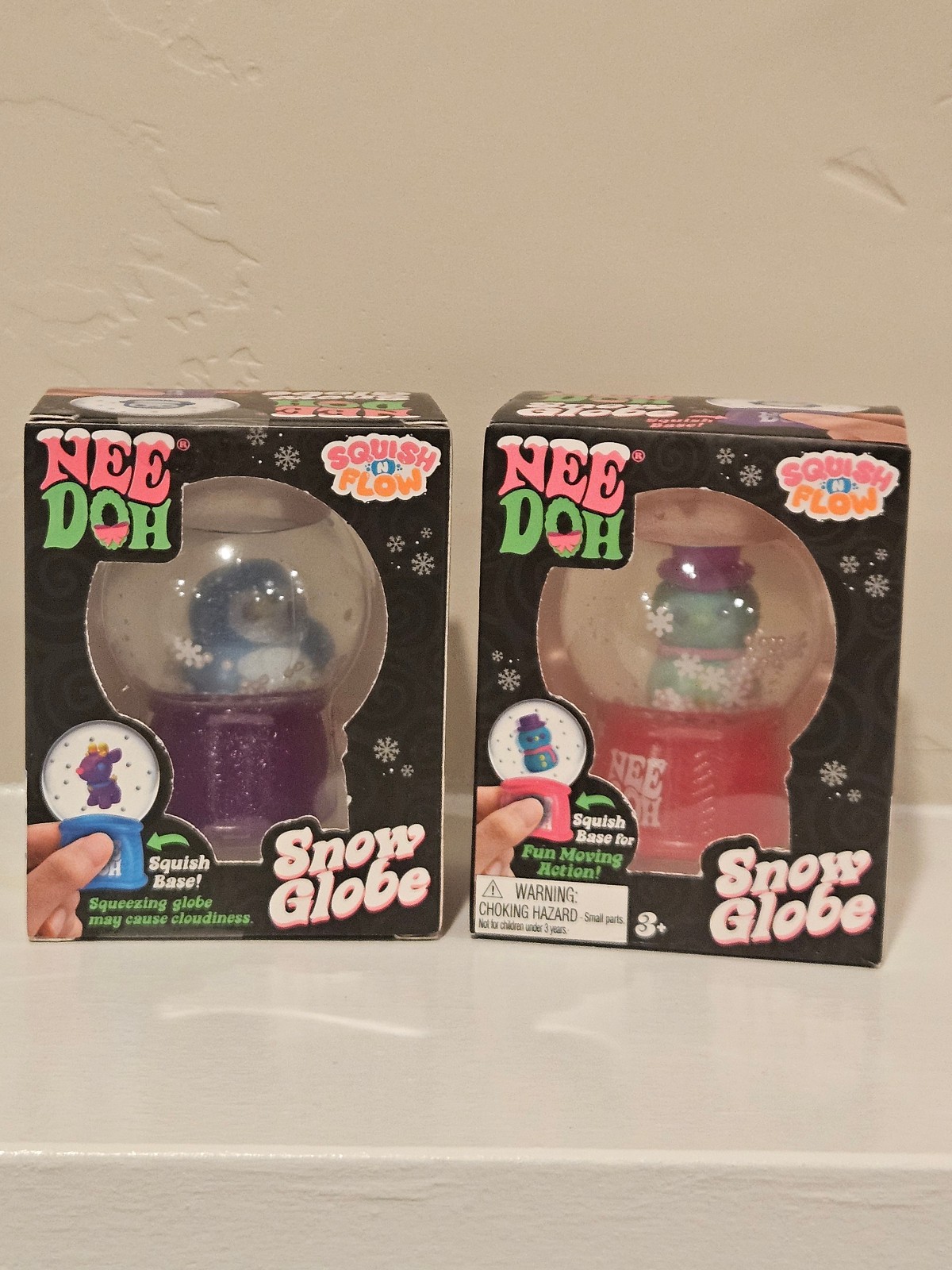 NeeDoh Snow Globe 2x Squishmas Set – Penguin & Snowman Schylling