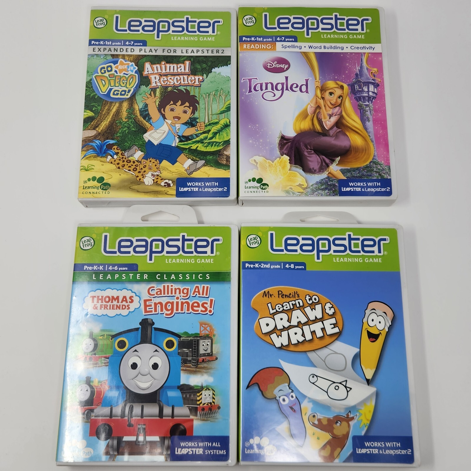 LeapFrog Leapster Learning Games Lot of 4 Disney Tangled Go Diego Go Thomas