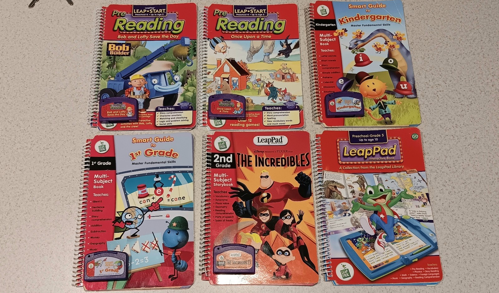 Lot of 6 LeapFrog Books & Cartridges: 1st/2nd Grade, Kindergarten, Pre-Reading
