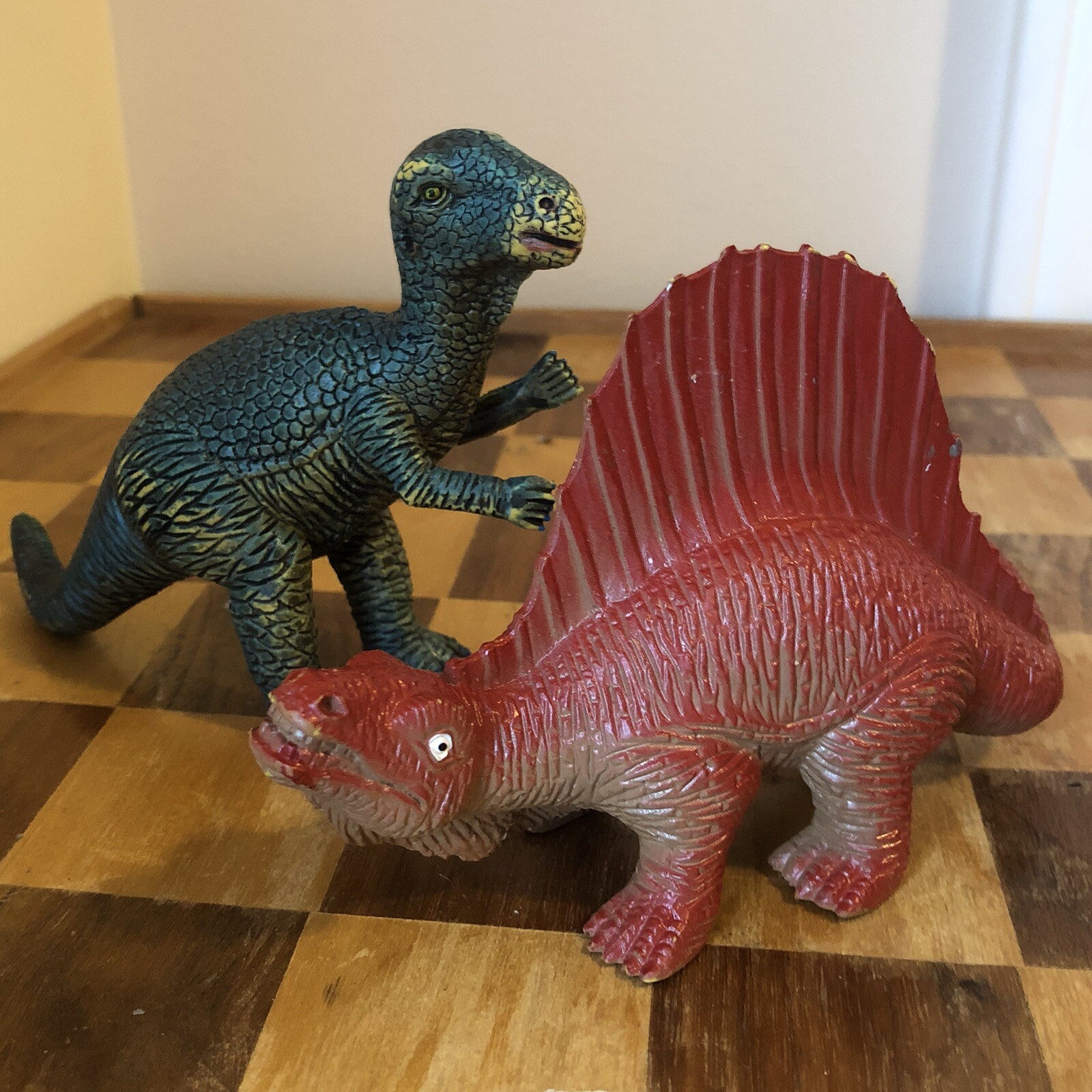 Iguanodon and Spinosaurus plastic dinosaur toys. Made in China. High quality