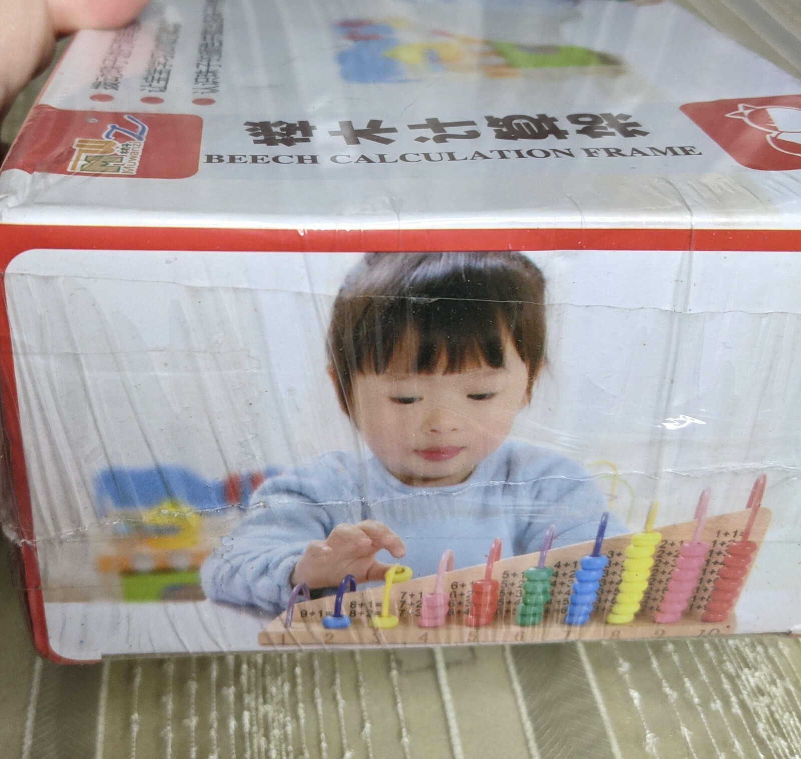 Beech Calculation Frame Abacus numbers, colors, operational symbols + – hands on