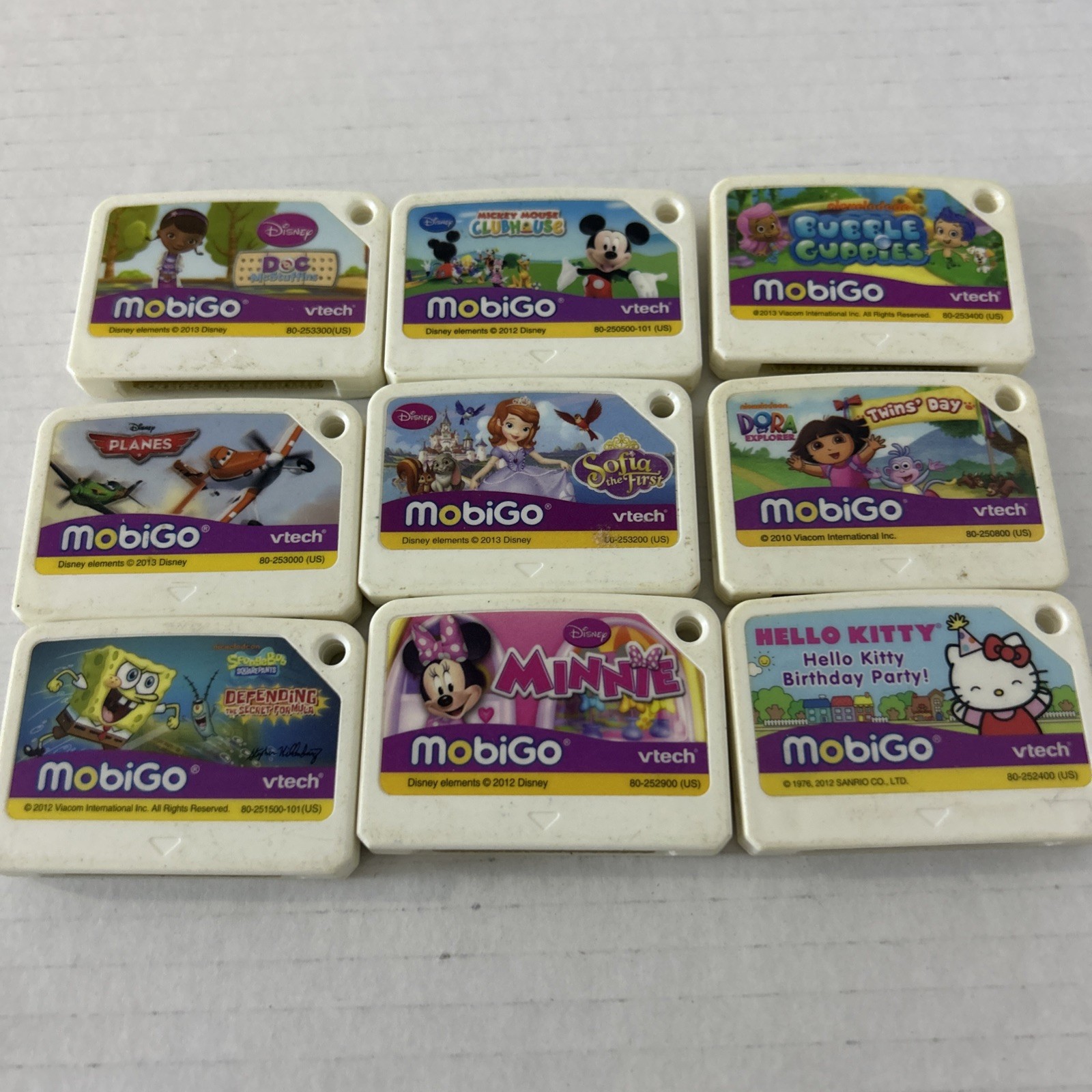 Vtech MobiGo V Reader Games Lot Of 9 Mickey Hello Kitty Nickelodeon Dora