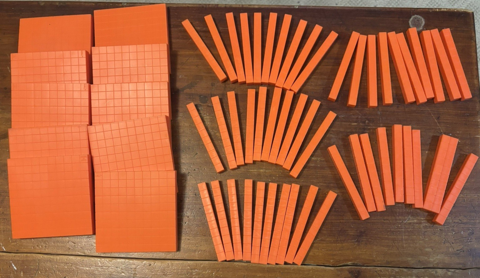 base ten place value blocks plastic 50- ten rods and 10 -hundred flats EUC