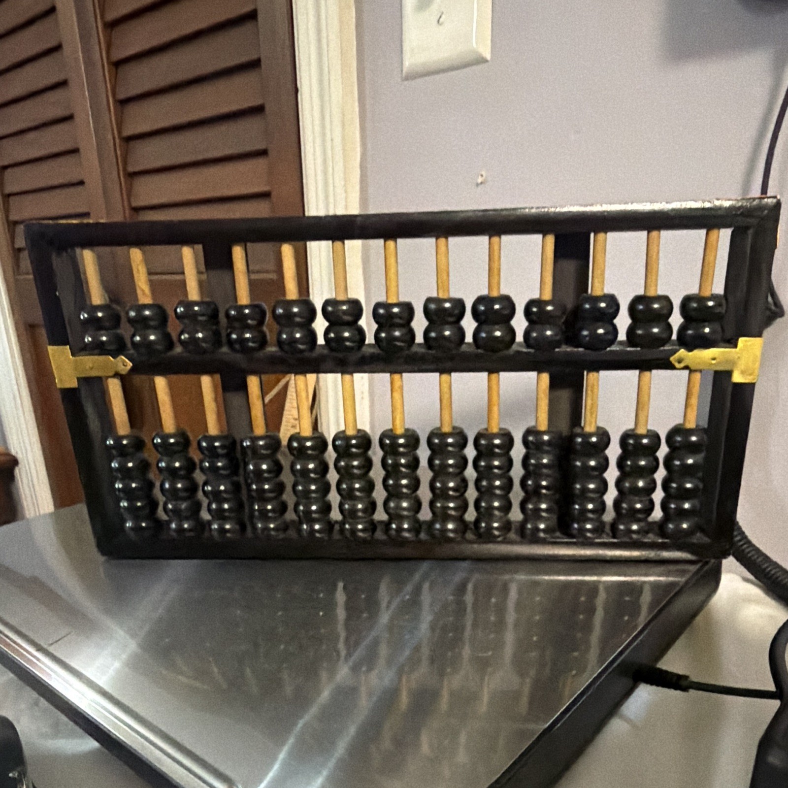 Lotus Flower Brand – Made in the people’s republic of china gold & black abacus