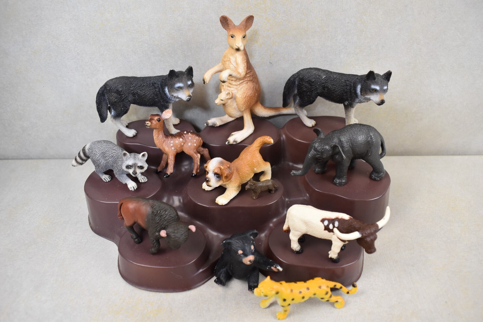 12 TOY ANIMALS WOLF, BEAR, DEER, RACOON, BULL, BISON, DOG, ELEPHANT, KANGAROO
